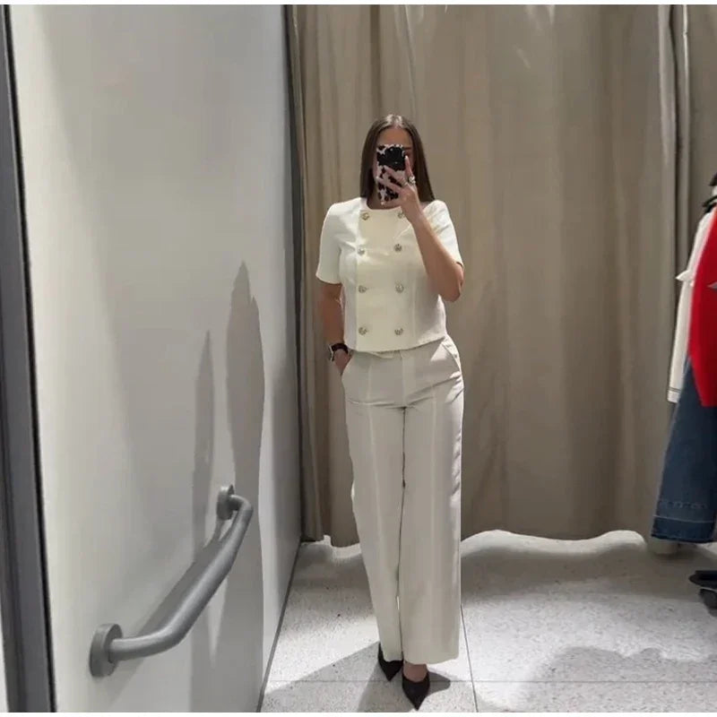Conjunto Elegance de duas peças: com colete (tipo blazer) de manga curta e calça perna larga
