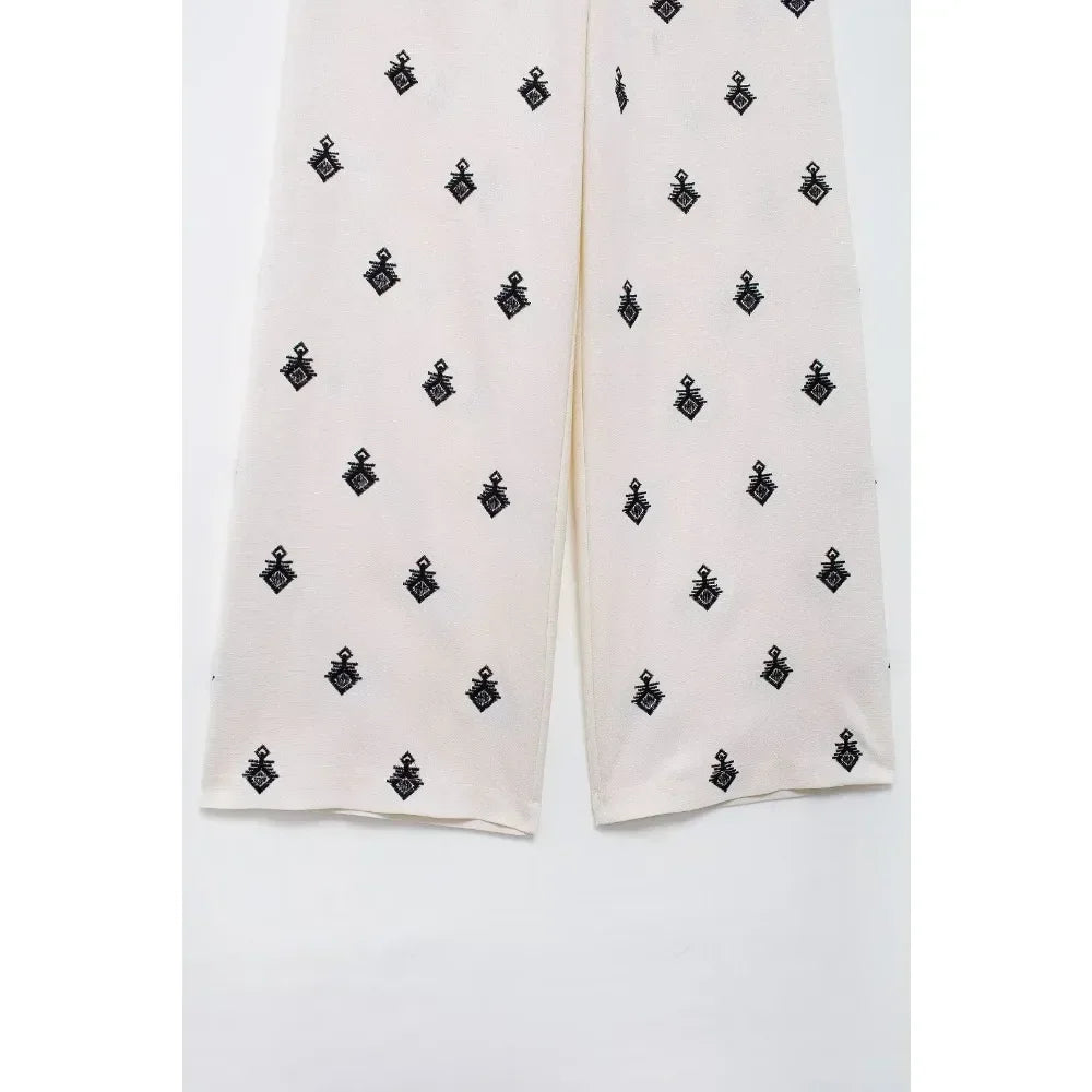 Conjunto Elegance: casual com 2 peças bordados com camisa tipo top de manga curta e lapela combinando calças largas