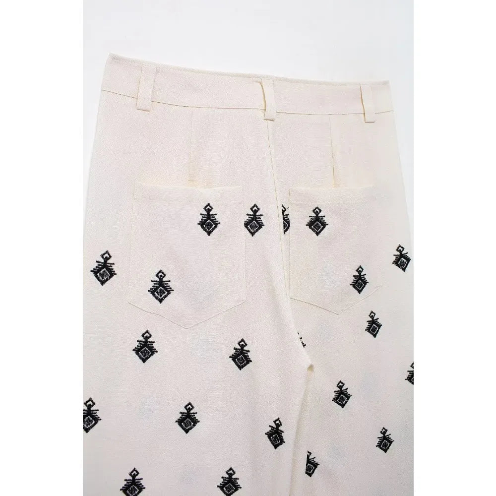 Conjunto Elegance: casual com 2 peças bordados com camisa tipo top de manga curta e lapela combinando calças largas