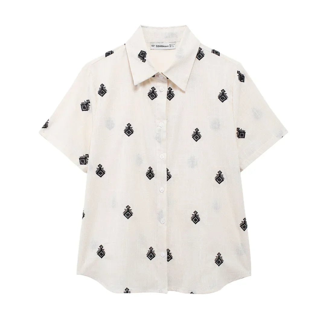 Conjunto Elegance: casual com 2 peças bordados com camisa tipo top de manga curta e lapela combinando calças largas