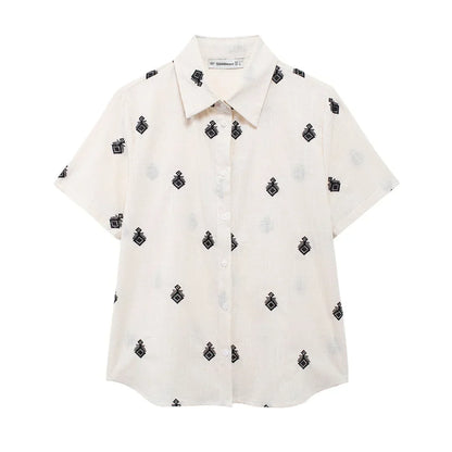Conjunto Elegance: casual com 2 peças bordados com camisa tipo top de manga curta e lapela combinando calças largas