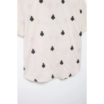 Conjunto Elegance: casual com 2 peças bordados com camisa tipo top de manga curta e lapela combinando calças largas