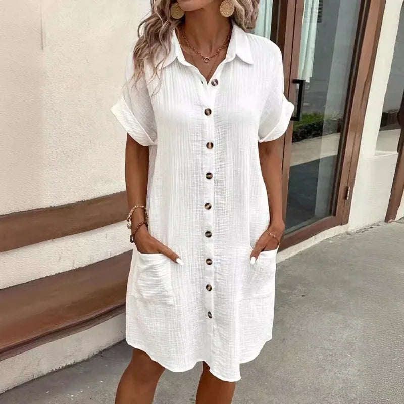 Camisa Vestido solto, minimalista com decote em V, botão acima, algodão e linho branco, manga curta e com bolso casual