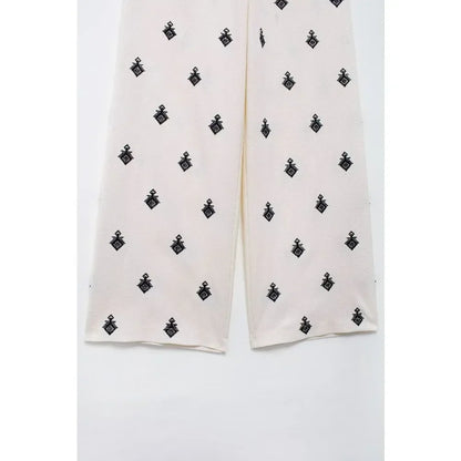 Conjunto Elegance: casual com 2 peças bordados com camisa tipo top de manga curta e lapela combinando calças largas