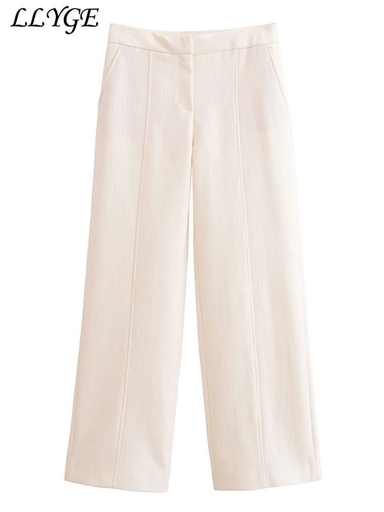 Conjunto Elegance de duas peças: com colete (tipo blazer) de manga curta e calça perna larga
