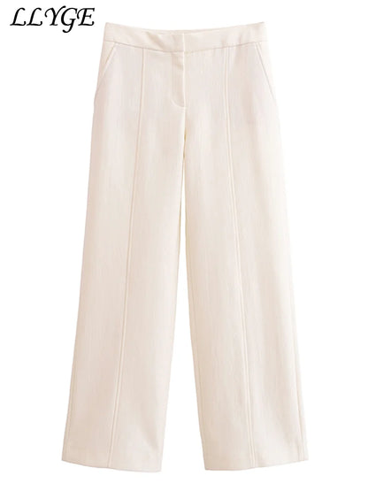 Conjunto Elegance de duas peças: com colete (tipo blazer) de manga curta e calça perna larga
