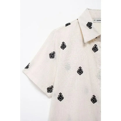 Conjunto Elegance: casual com 2 peças bordados com camisa tipo top de manga curta e lapela combinando calças largas