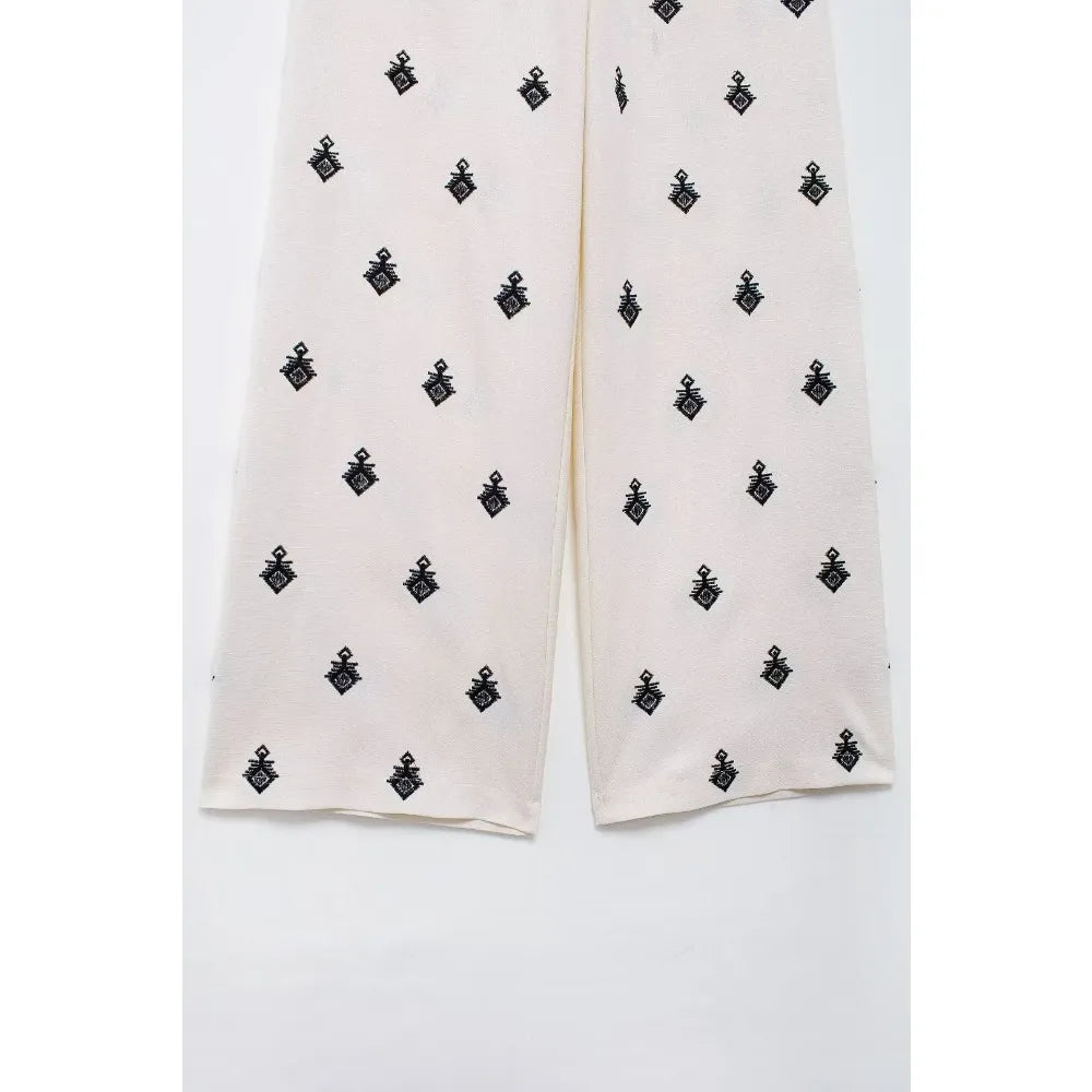 Conjunto Elegance: casual com 2 peças bordados com camisa tipo top de manga curta e lapela combinando calças largas