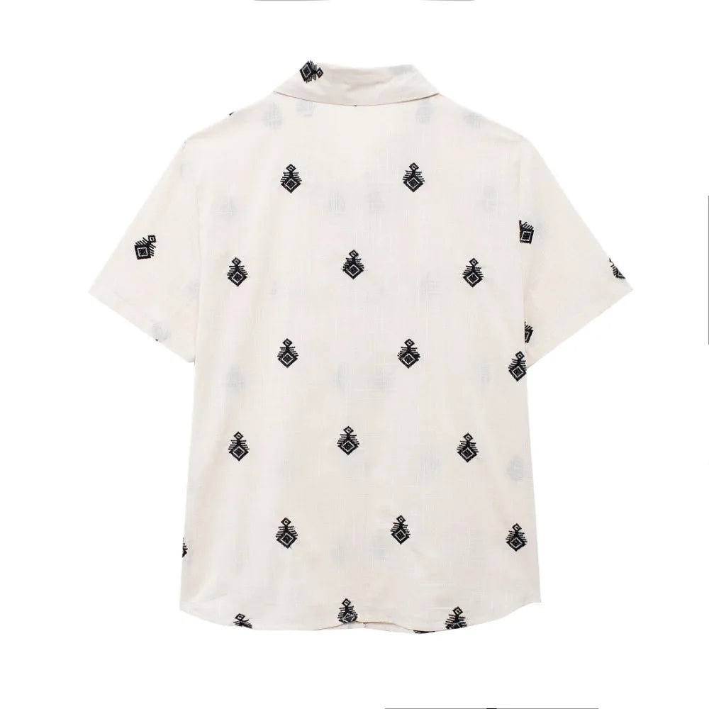 Conjunto Elegance: casual com 2 peças bordados com camisa tipo top de manga curta e lapela combinando calças largas