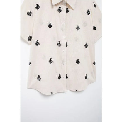 Conjunto Elegance: casual com 2 peças bordados com camisa tipo top de manga curta e lapela combinando calças largas