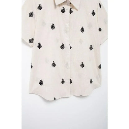 Conjunto Elegance: casual com 2 peças bordados com camisa tipo top de manga curta e lapela combinando calças largas