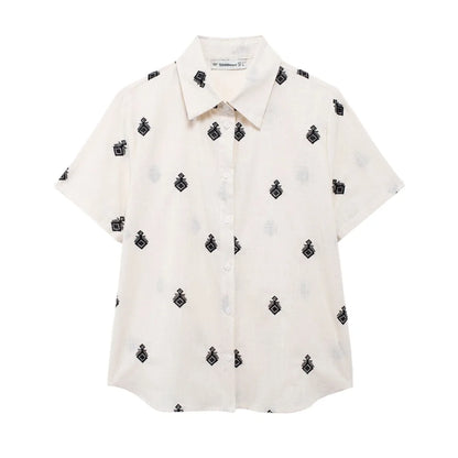 Conjunto Elegance: casual com 2 peças bordados com camisa tipo top de manga curta e lapela combinando calças largas