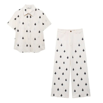 Conjunto Elegance: casual com 2 peças bordados com camisa tipo top de manga curta e lapela combinando calças largas